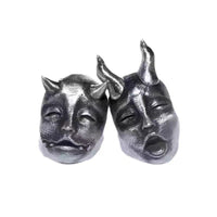 A pair of short and long horns